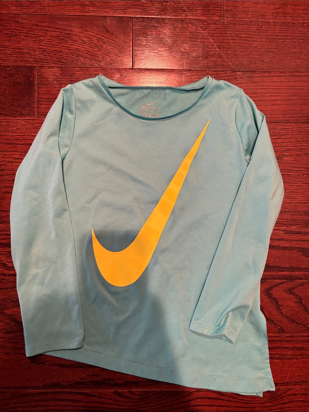Nike Kids Long Sleeve Tee in Light Blue with Yellow Swoosh